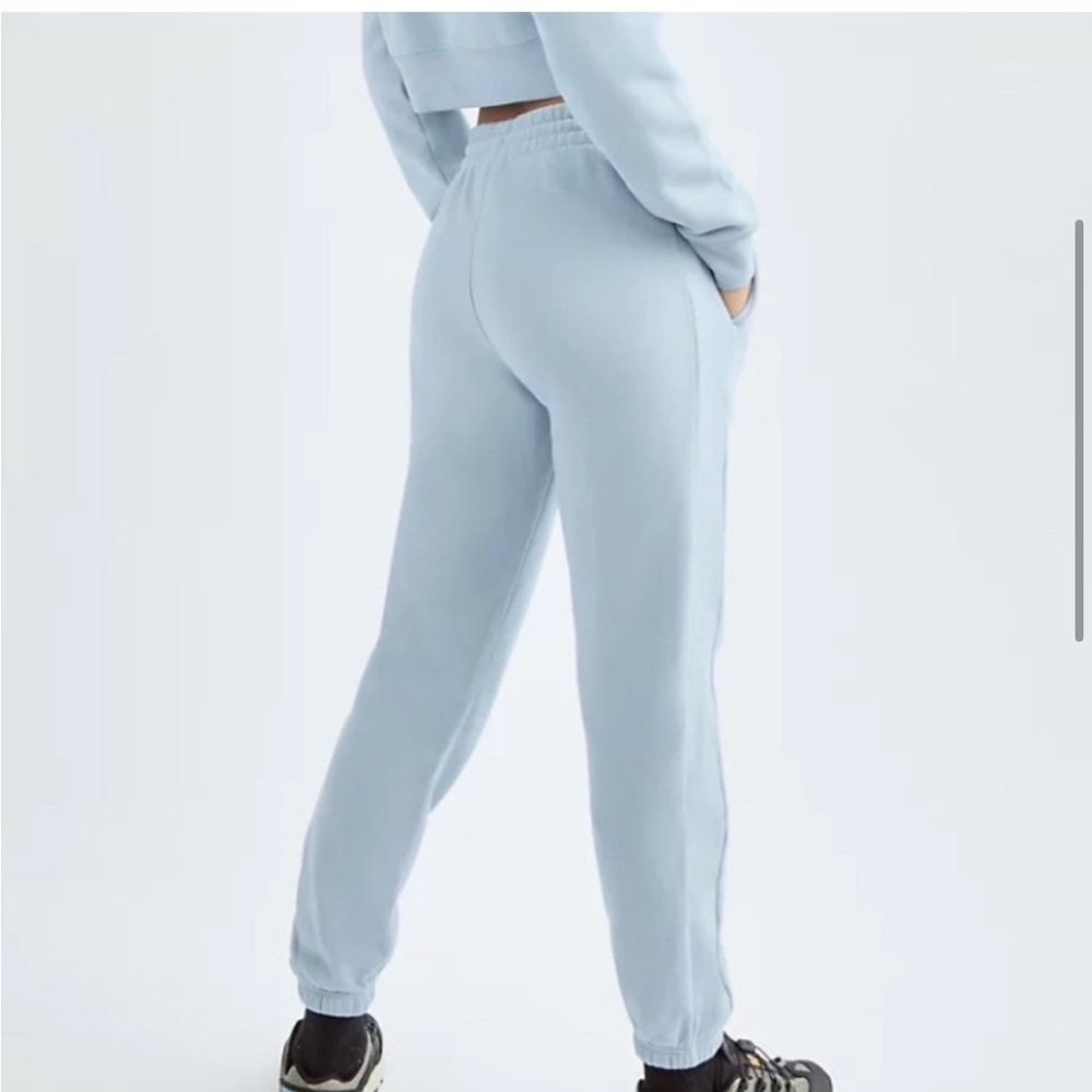 TNA Blue High-Waisted Track Pants with Elastic Cuffs
